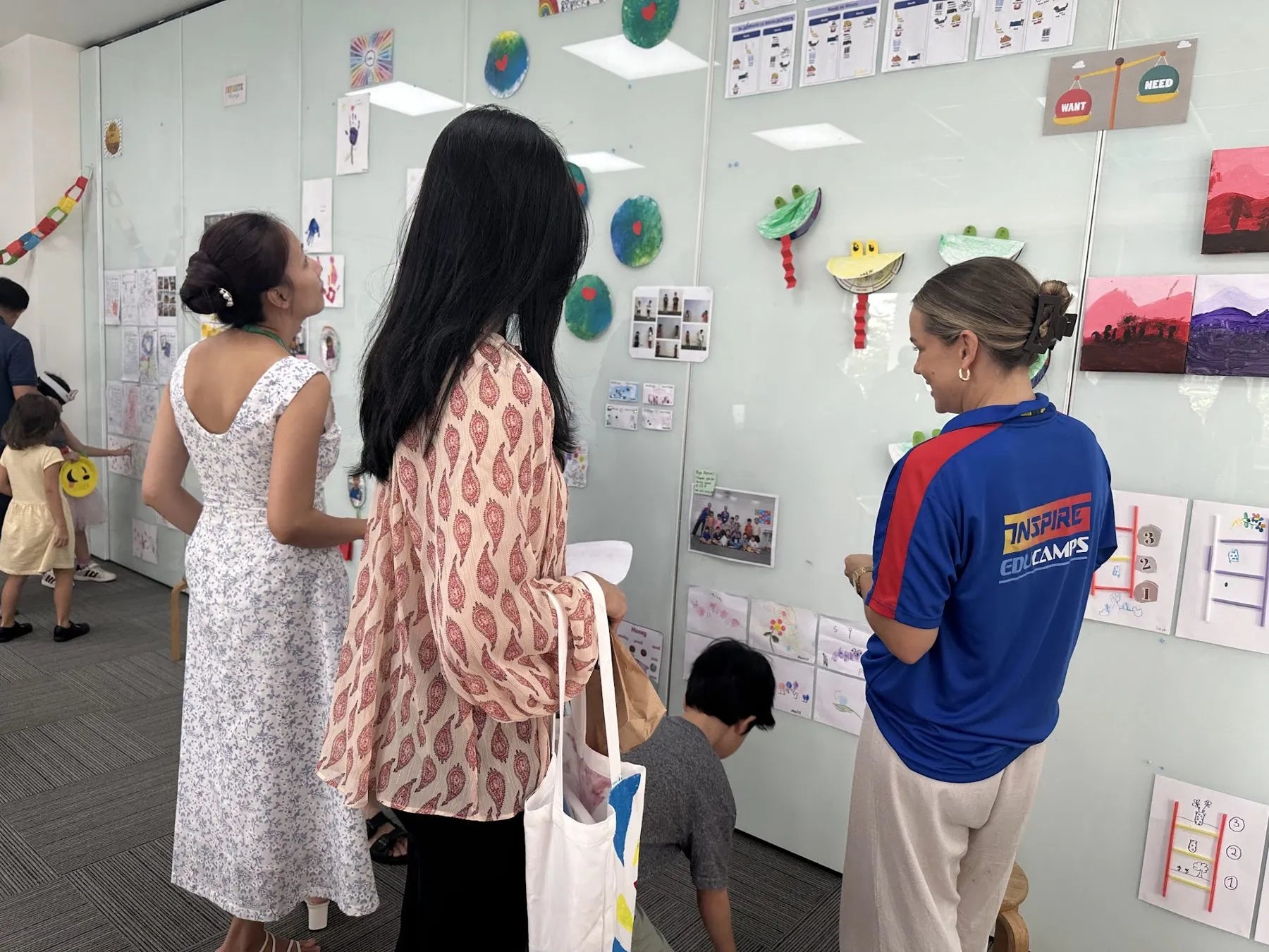Parents with a Group Leader at the displays